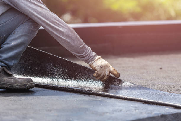 Professional Exterior Waterproofing technician working in Delafield, WI